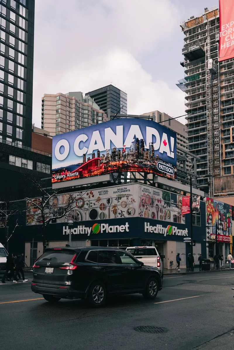 A roadside billboard advertising a property